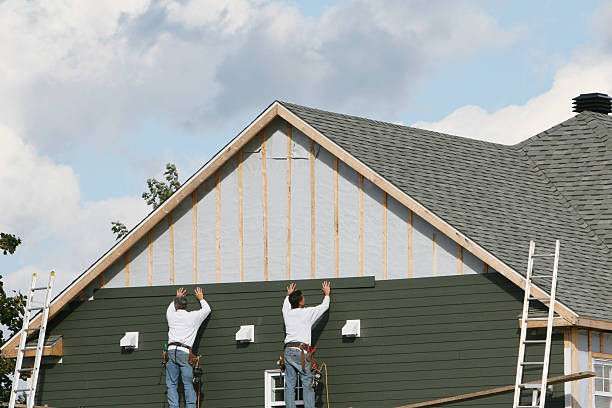 Professional Siding technician working in Terrell, TX
